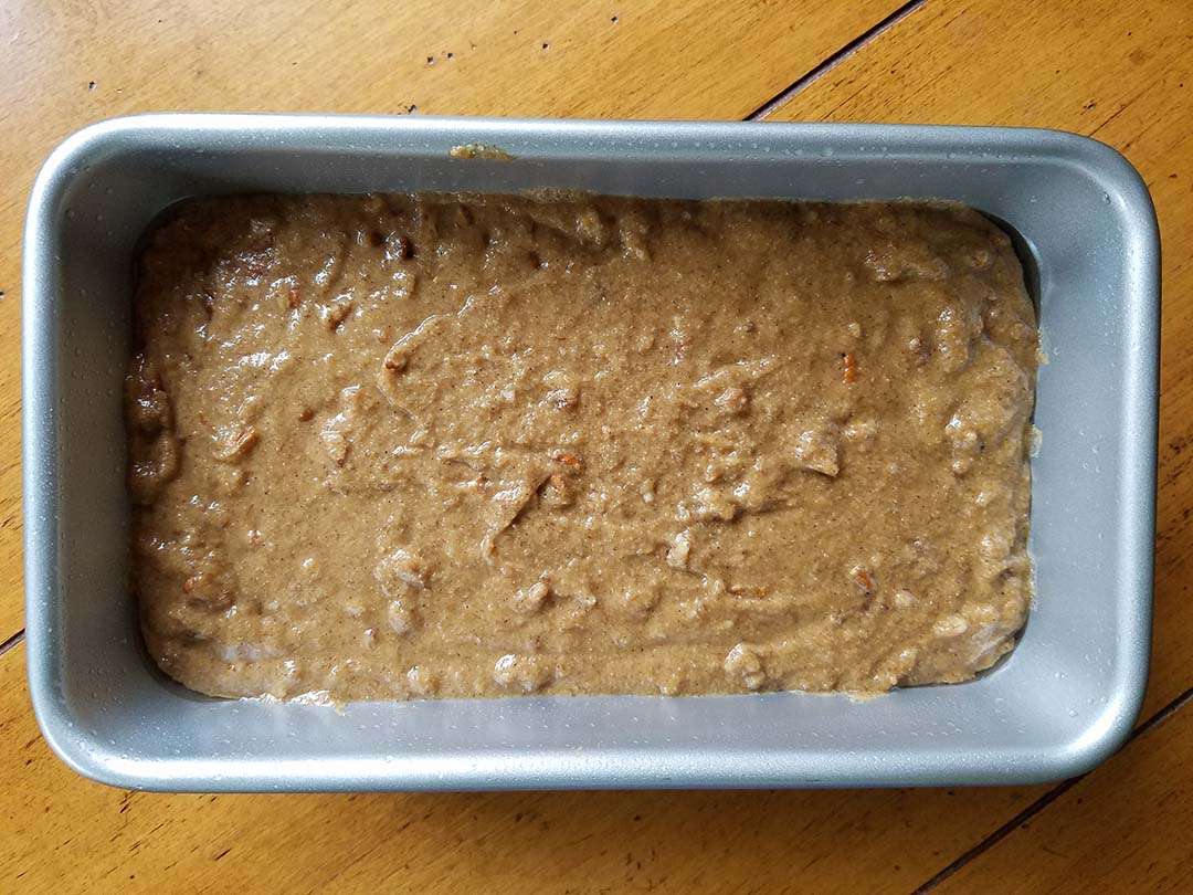 banana bread batter in bread pan ready to bake