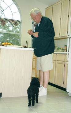 Father's Day Dad and Sammie having a snack and reading the newspaper