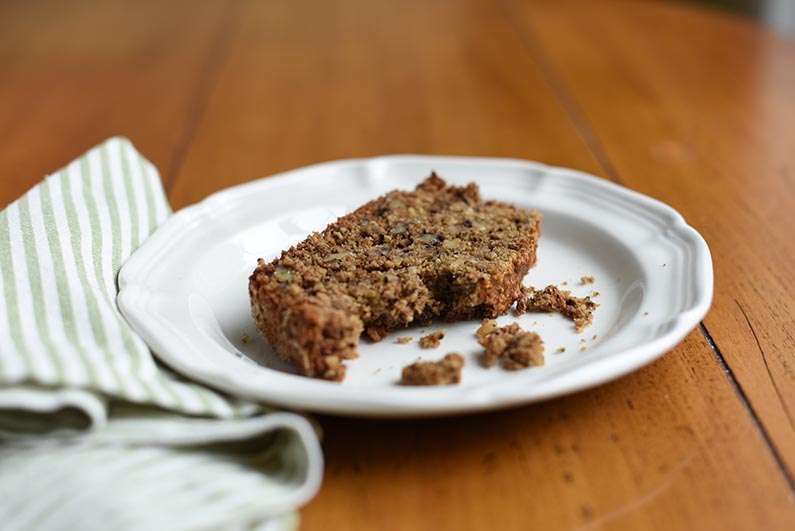 Maple Oat Banana Walnut Bread - eating bread